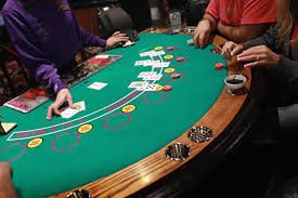 Filipino players browsing ckcbet casino games on smartphones at home